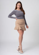 Ruffle mini rok stretch met plooien beige