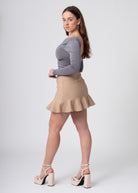 Ruffle mini rok stretch met plooien beige